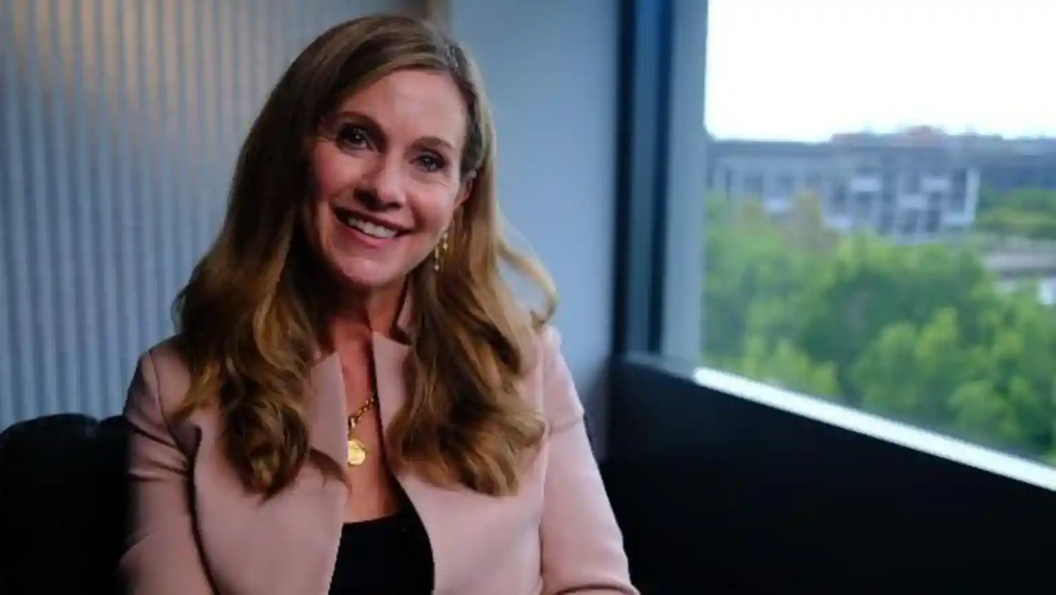 The woman tasked with kicking Australian kids off social media