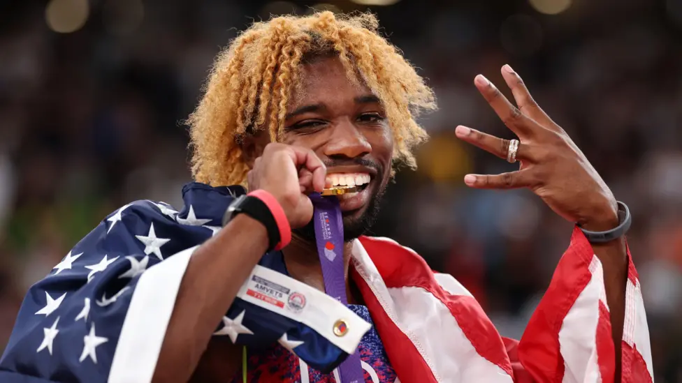 There is more to Noah Lyles than just the showmanship, the grandstanding and the dyed orange hair.</b> The irrepressible American held off a stellar field in the 200m final at the World Athletics Championships in Tokyo on Friday to win his fourth successive world title in the discipline.