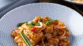 Crispy chicken tossed in a glossy sweet-spicy sauce with crunchy vegetables, Beijing Chicken remains one of the most-loved Indo-Chinese dishes across India