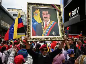 Thousands of backers of Venezuela's former leader Nicolas Maduro, who was ousted in a deadly US military operation, marched in Caracas on Tuesday to demand his