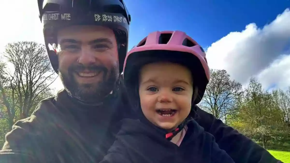 A father and his toddler daughter have gone viral after sharing videos of their bike rides together, with heartwarming clips of their outings crossing millions