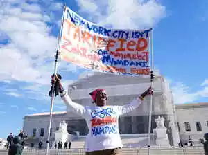 US President Donald Trump warned of an economic and national security “disaster” if the Supreme Court rules against his tariff powers