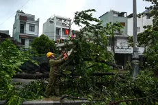 Typhoon Kalmaegi, one of the year's deadliest storms, has headed west to Cambodia and Laos after barreling through central Vietnam on Thursday with winds of up