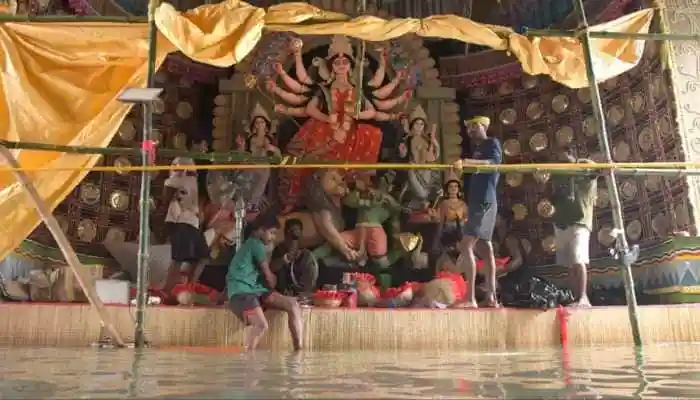 Unprecedented pre-Puja rain has submerged Kolkata, leaving 11 people dead and paralyzing the city. The record-breaking deluge has disrupted life, damaged pandals, and sparked a political controversy. A torrential overnight rain, the greatest in almost four decades, has thrown Kolkata into turmoil, killing 11 people and inundating the City of Joy under knee-deep waters. The torrent has brought the 335-year-old city to its knees, shutting down transport systems and shrouding preparations for the next Durga Puja festival.