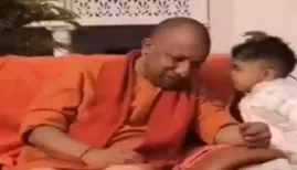 As the young child asks for chips, UP Chief Minister Yogi Adityanath responds with a smile, visibly amused by the candid request. The exchange lasts only a few