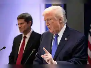 The U.S. plans to process 4,500 white South African refugees monthly, significantly exceeding its stated goals, by establishing a modular processing village on