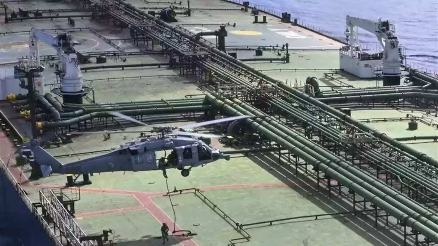 The US says its forces have boarded a sanctioned ship carrying Iranian oil in the Indian Ocean in the country's latest naval move against Iran