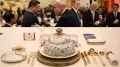 When world leaders sit across a dining table, the food rarely serves a purely culinary purpose. This familiar setup with a strategic warmth was once again on