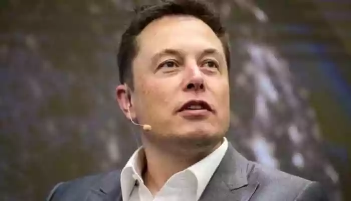 Elon Musk stated that advancements in artificial intelligence (AI) and robotics will make working 