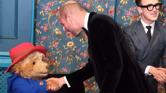The Prince and Princess of Wales shook hands with Paddington Bear and discussed marmalade sandwiches backstage at this year's Royal Variety Performance
