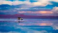 Discover the best time to visit the world's largest salt flats in 2026 for the famous mirror effect. From crimson lagoons to the haunting train cemetery
