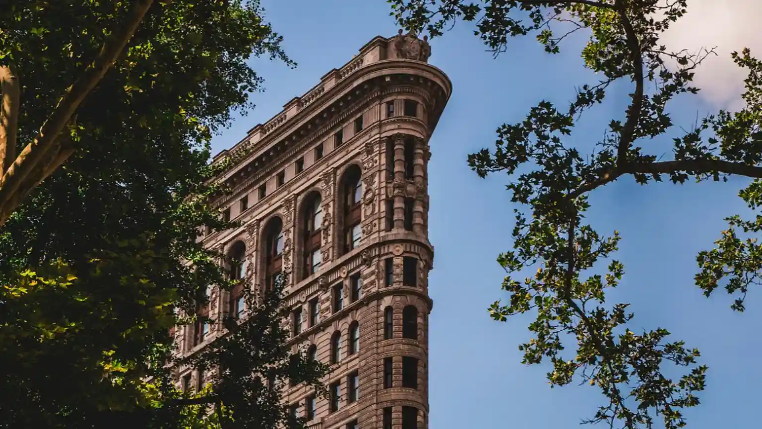 The Flatiron Building - with its unique triangular shape, narrow prow, ornamental columns and intricate decorative details - has been one of the most
