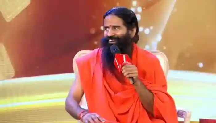 Yoga guru Baba Ramdev also joined him on stage, where they discussed a range of topics including the India–US trade agreement and the changing global